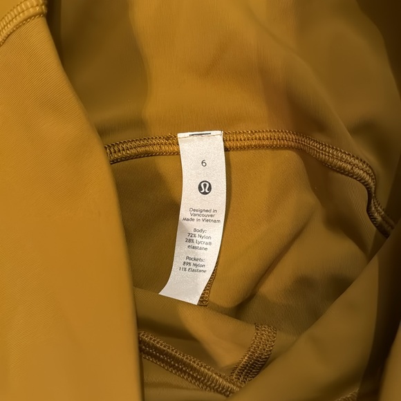 Lululemon leggings with pockets.  New without tags.  Size 6.  Golden yellow. - Picture 2 of 3